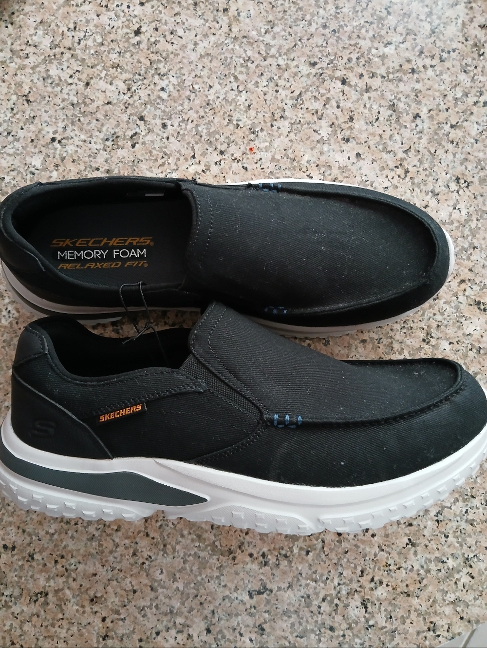 Men's Skechers Black Slip-On Loafers with White Sole